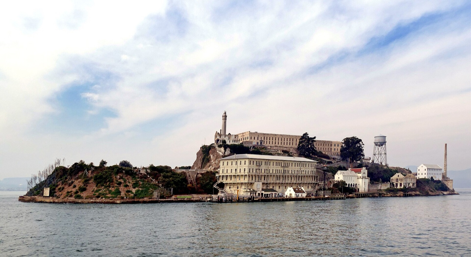 Alcatraz Island seen across the blue water of San Francisco Bay