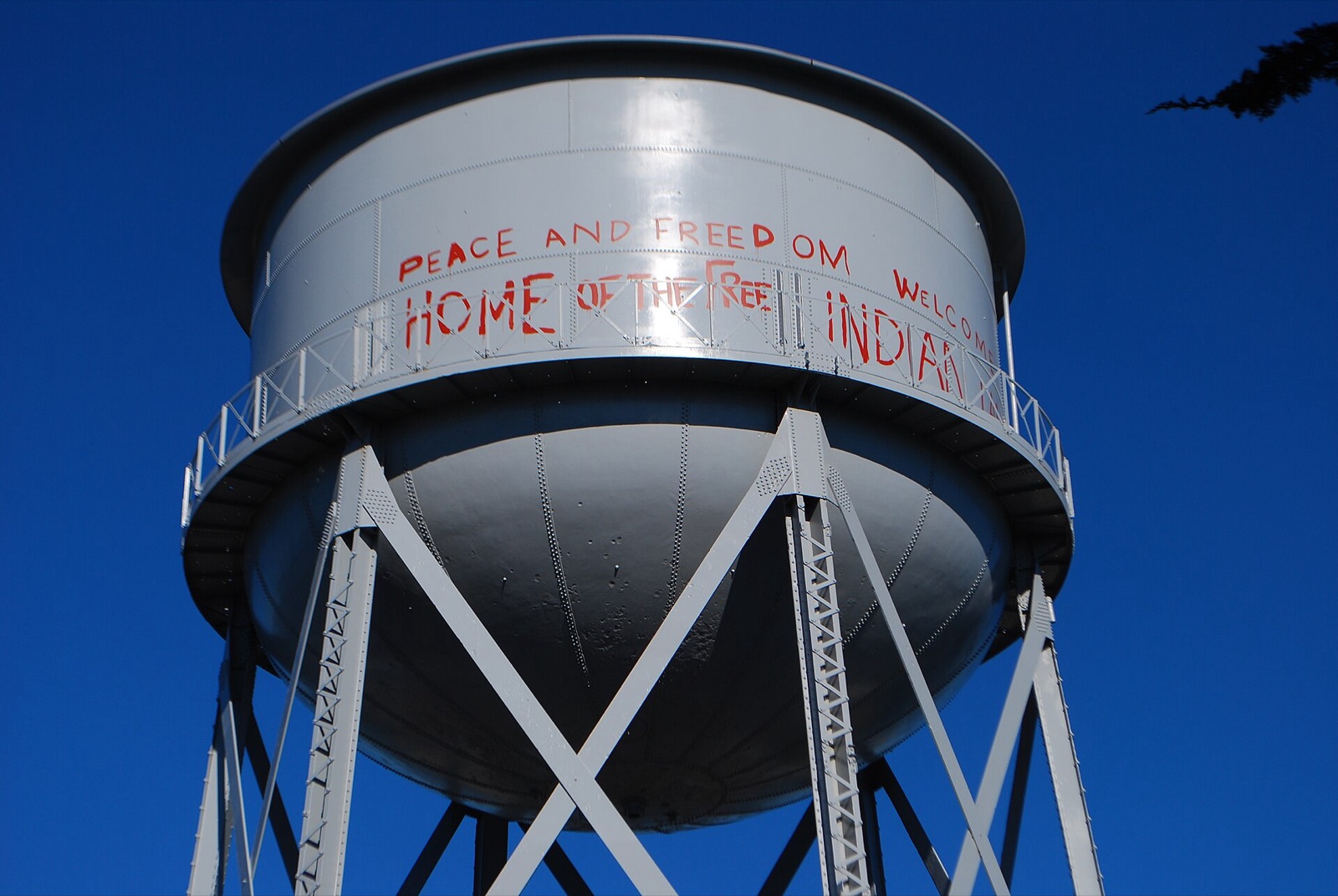 Painted words Welcome to Indian Land on an Alcatraz Island building